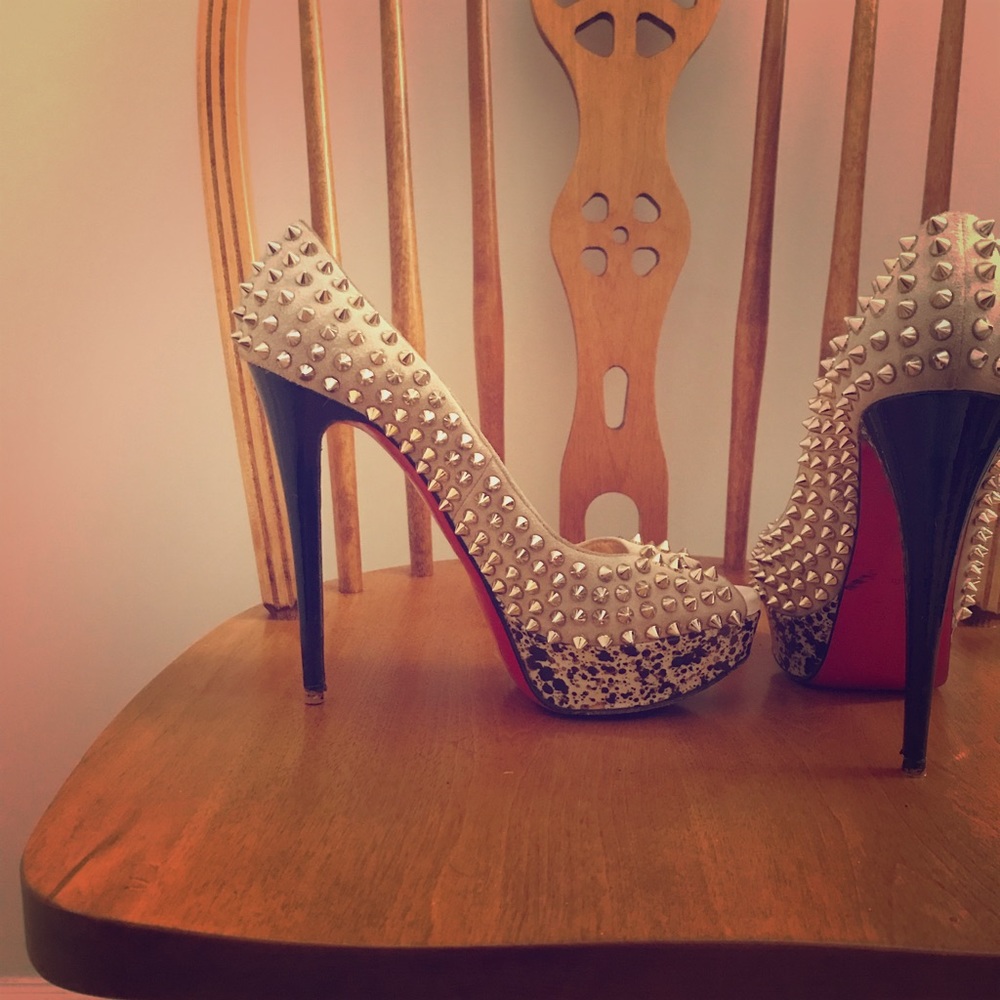Christian Louboutins’s lady peep toe spiked pumps